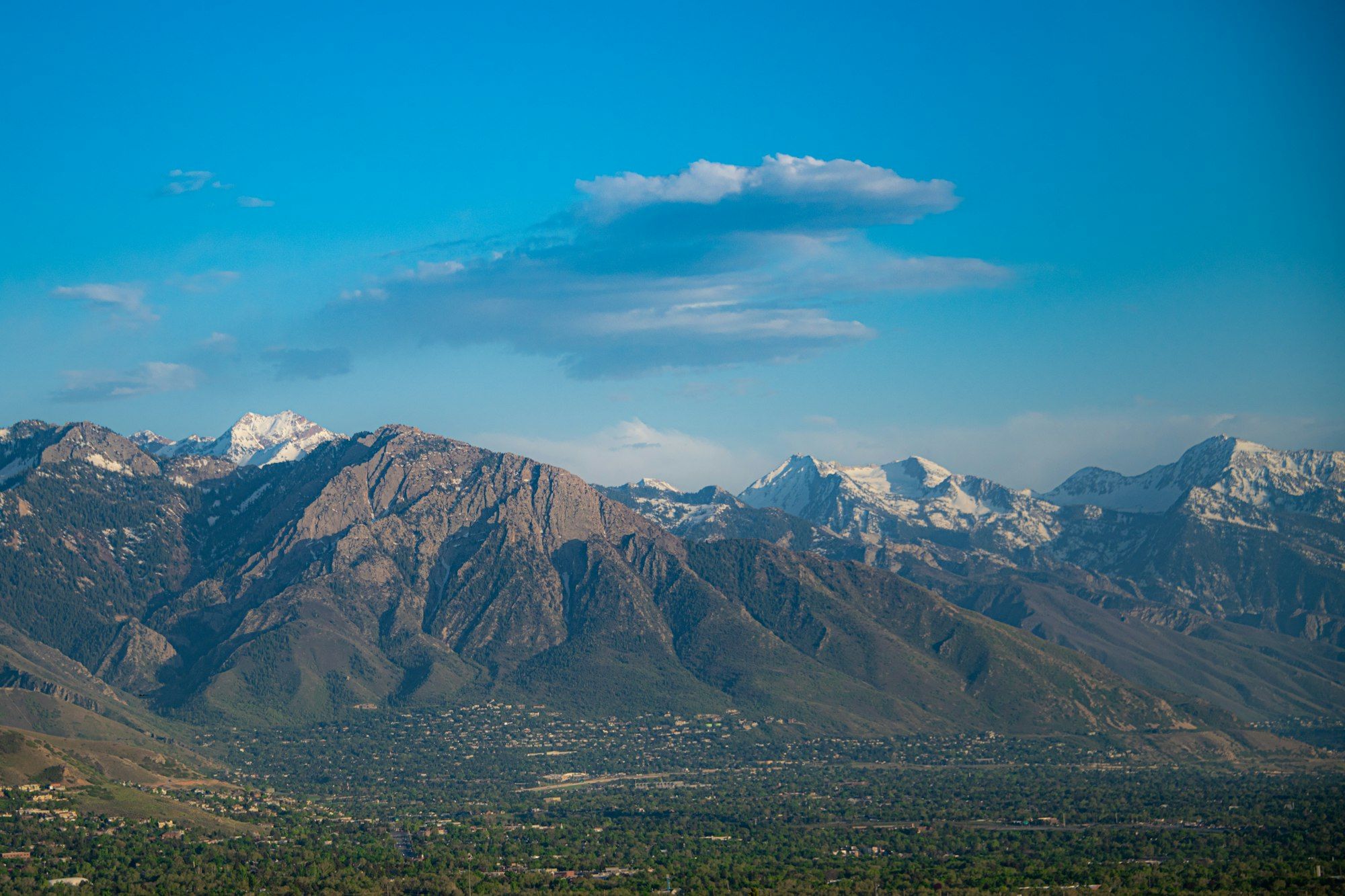 Mount Olympus rising above Salt Lake City neighborhoods.