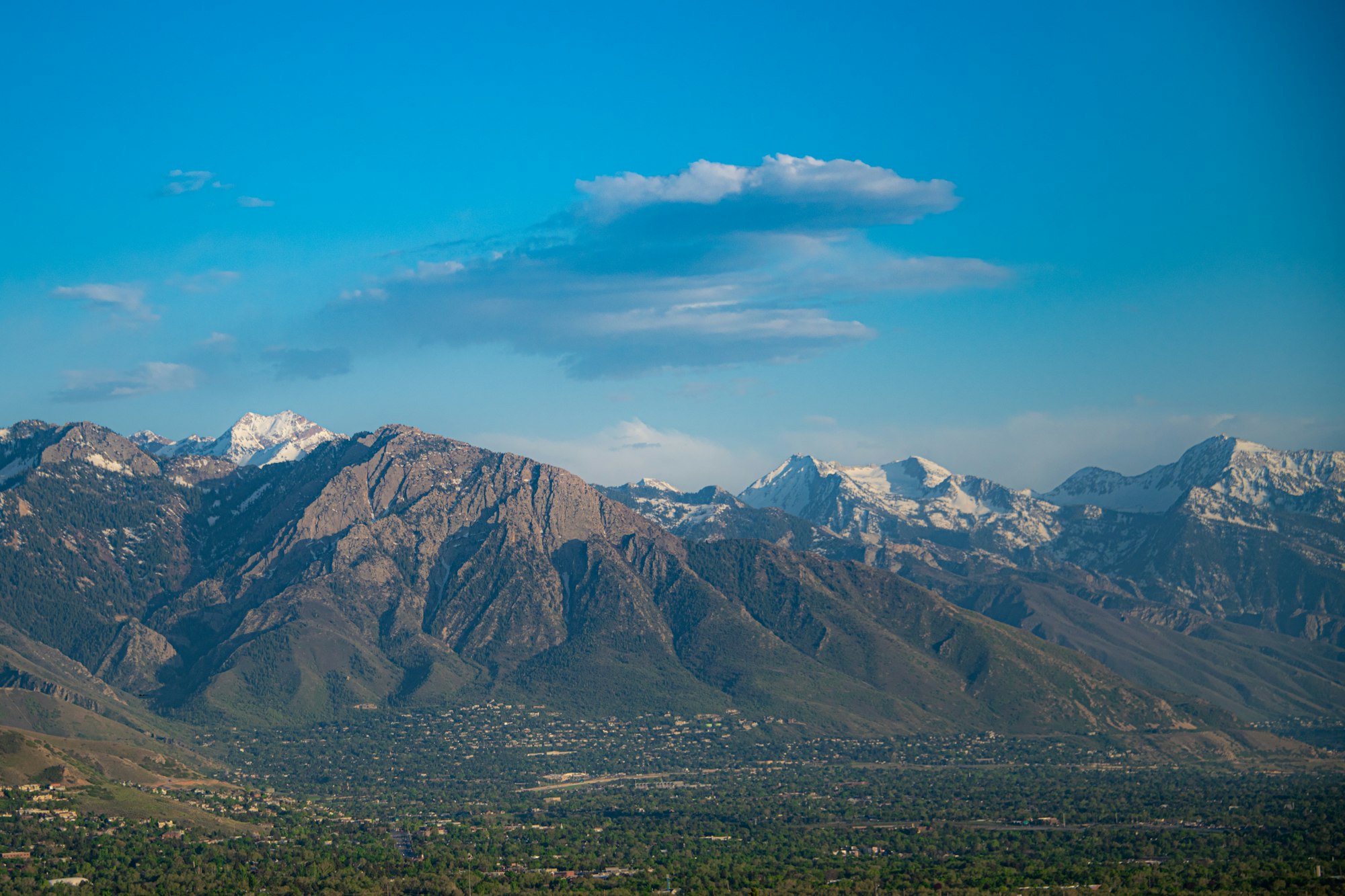 Mount Olympus rising above Salt Lake City neighborhoods.